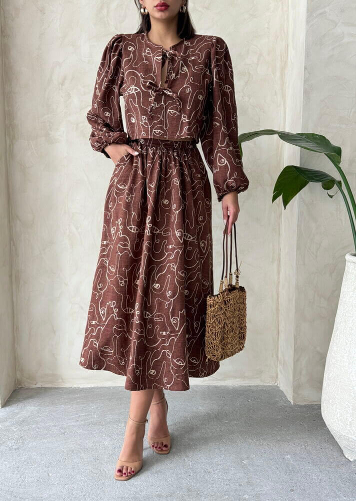 Boho printed linen two-piece set featuring a stylish blouse and skirt, ideal for casual and relaxed occasions.