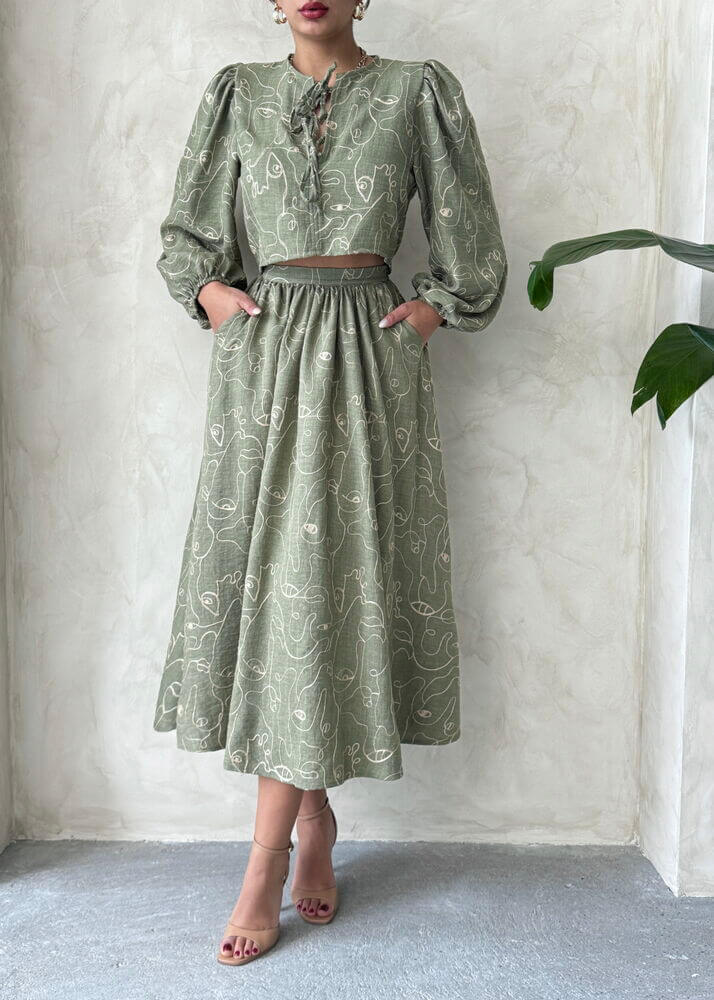 Boho print linen two-piece set featuring a blouse and matching skirt in a light green design, perfect for casual wear.
