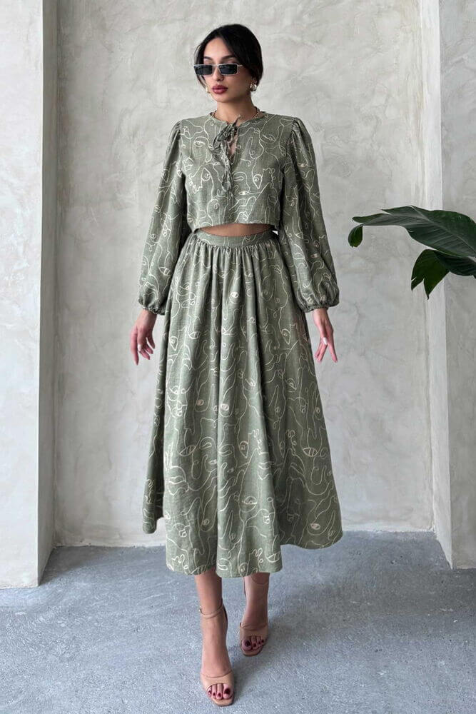Boho print linen two-piece set featuring a chic cropped blouse and matching skirt, perfect for casual or relaxed gatherings.