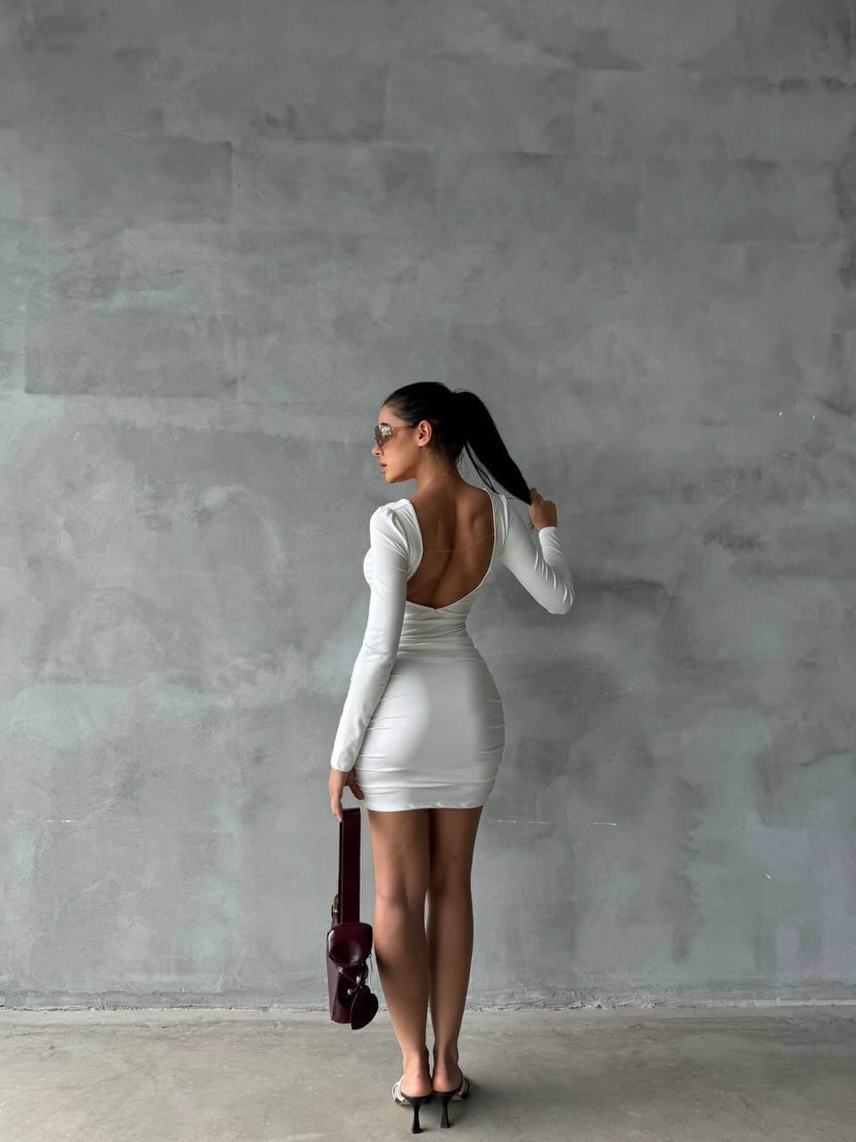 Women's Short White Skinny Dress with a Bra-Style Top, Open Back, Stretchy Fabric, and Length Below the Hips