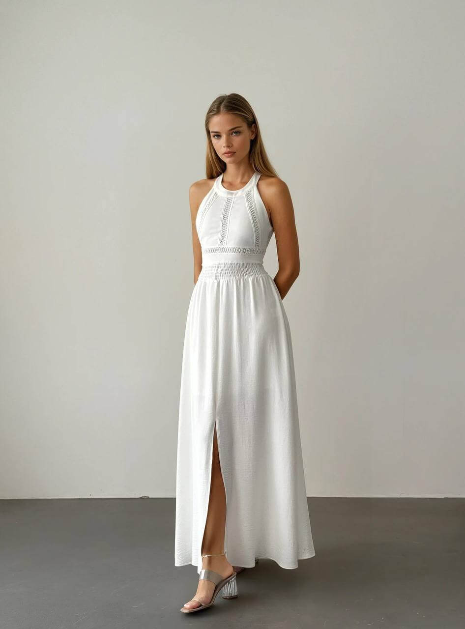 Stunning white boho maxi dress with a light and airy feel.
