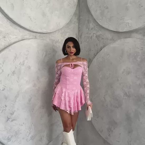 Pink princess dress with lace sleeves, featuring intricate lace details and a bust glop with shorts inside. The dress is made of full lycra stretch lace.