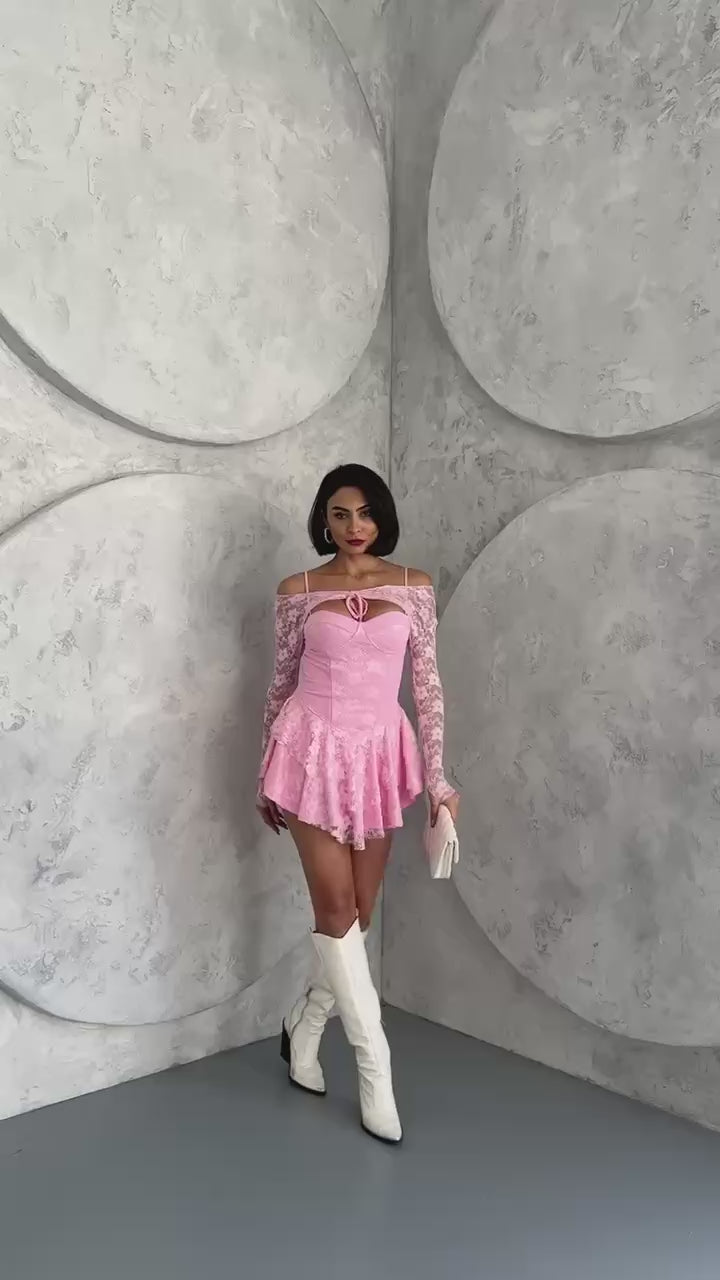 Pink princess dress with lace sleeves, featuring intricate lace details and a bust glop with shorts inside. The dress is made of full lycra stretch lace.