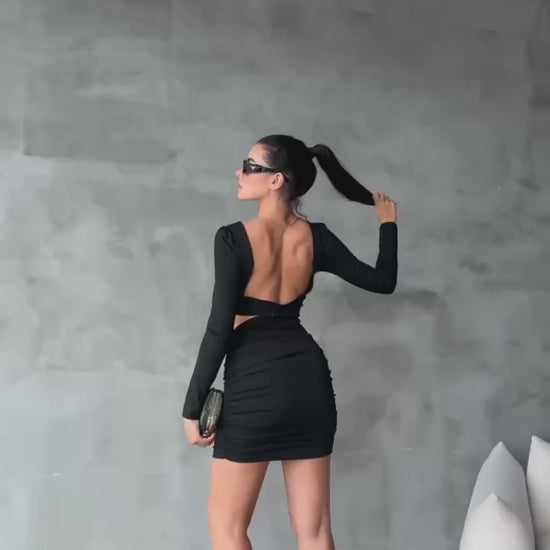 Women's Short Black Skinny Dress with a Bra-Style Top, Open Back, Stretchy Fabric, and Length Below the Hips