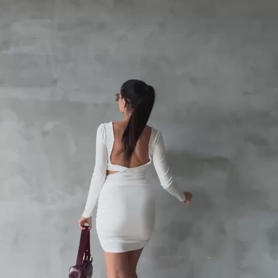 Women's Short White Skinny Dress with a Bra-Style Top, Open Back, Stretchy Fabric, and Length Below the Hips