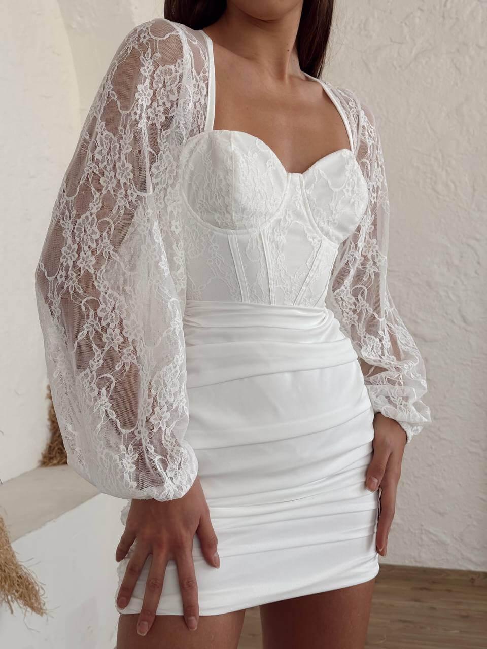 white Short dress with long lace sleeves.