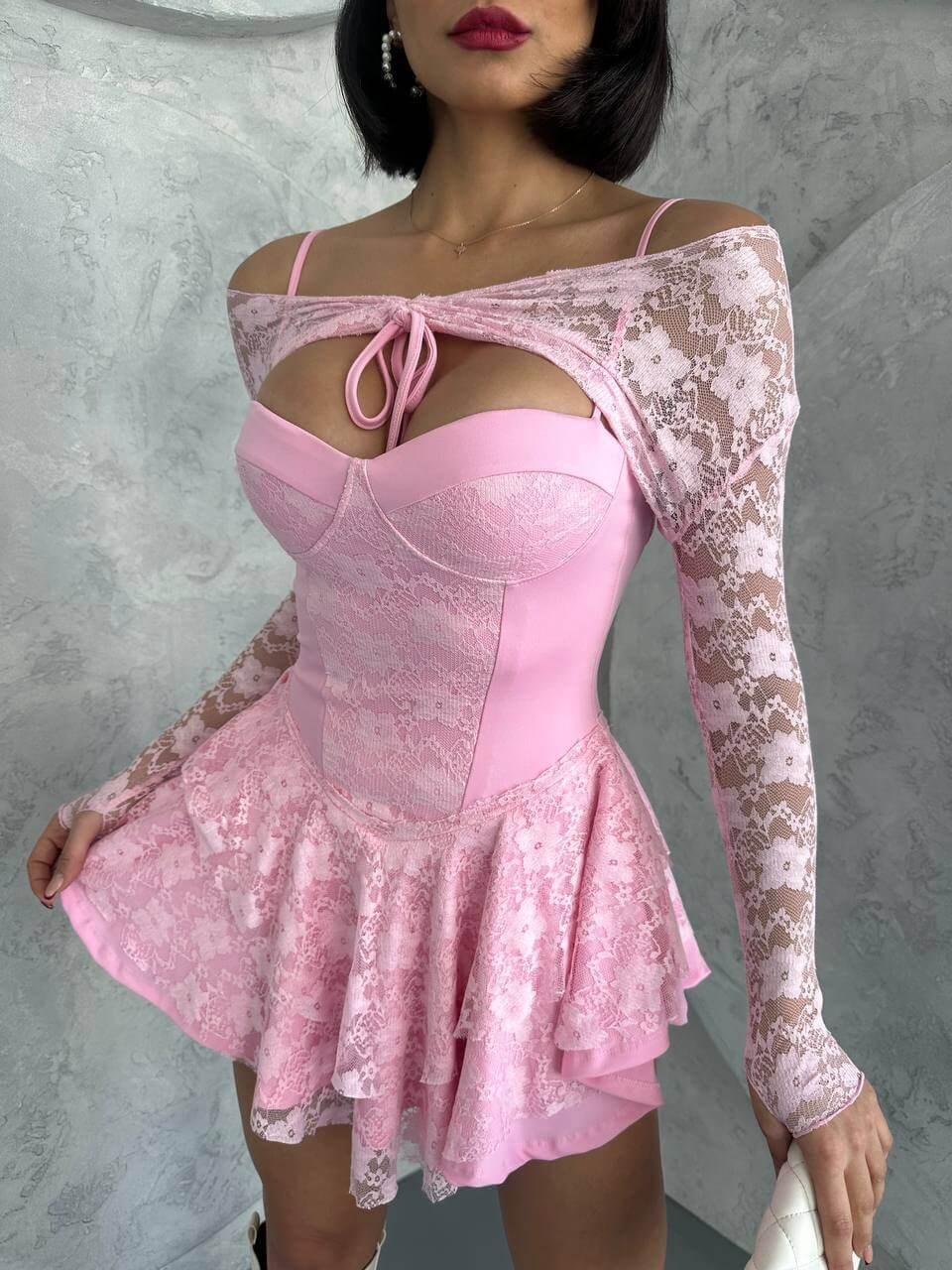 Pink princess dress with lace sleeves, featuring intricate lace details and a bust glop with shorts inside. The dress is made of full lycra stretch lace.