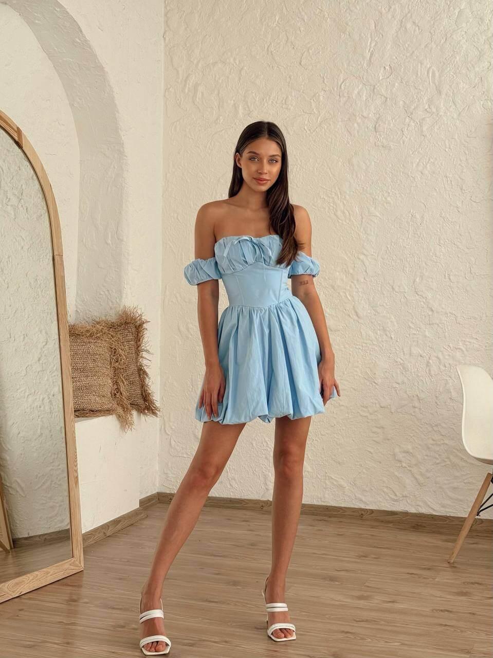 Women's short light blue dress with off-the-shoulder sleeves