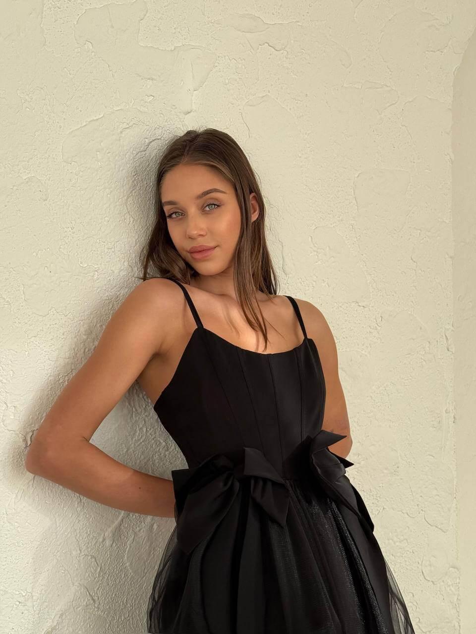 Women's short Black sleeveless dress above the knee