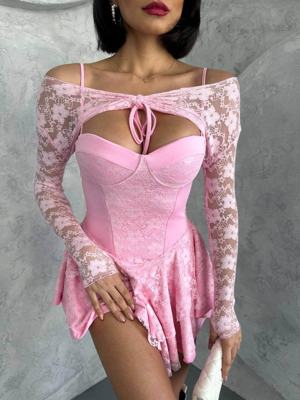Pink princess dress with lace sleeves, featuring intricate lace details and a bust glop with shorts inside. The dress is made of full lycra stretch lace.